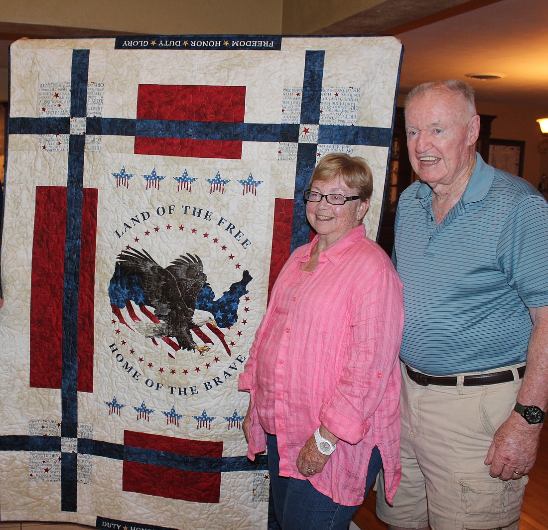  Cindy Jone presented Retired Capt. John D. McCarthy with a Quilt of Valor (Courtesy photo).