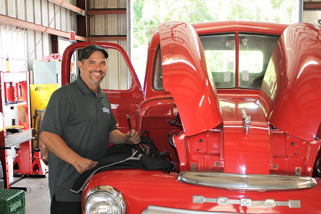 Tim Goeman works on a 1949 Dodge truck at his new business, Southern Auto Source. Photo by Wayne Grant