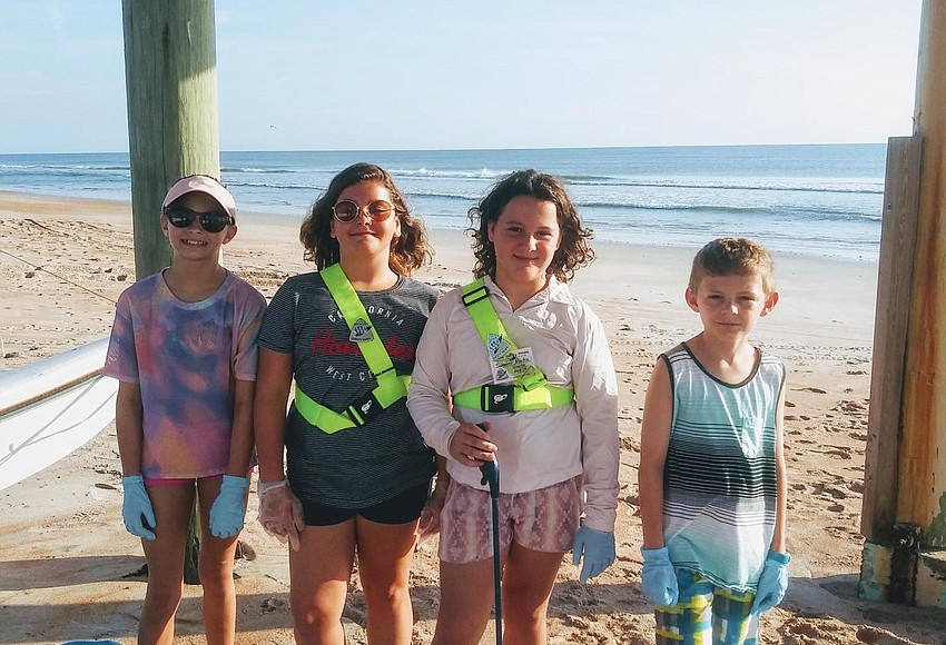 Tomoka Elementary students help clean up the beach | Observer Local ...