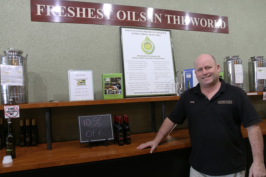 The Ormond Beach Olive Oil Company, owned by Greg Jensen, has shipped bottle worldwide. Photo by Jarleene Almenas