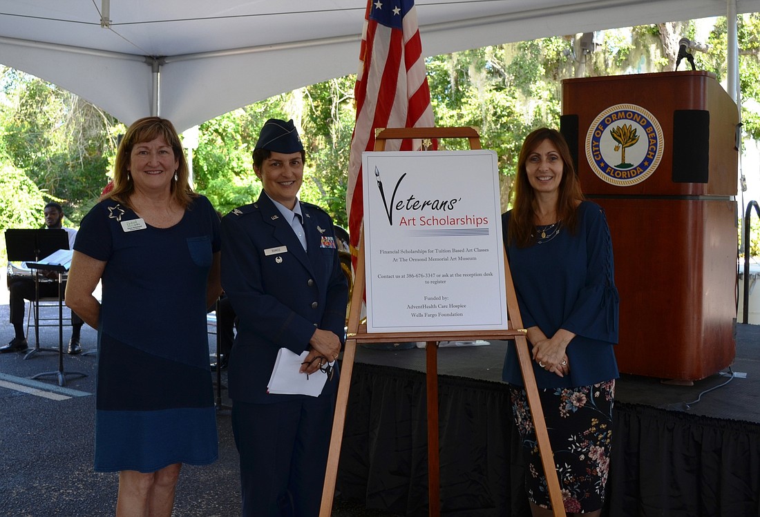 A donation will provide veterans with access to art experiences. Shown are Ormond Memorial Art Museum Director Susan Richmond, retired U.S. Air Force Col. Kimberley Ramos and HospiceCare Administrative Director Rema Cole.
