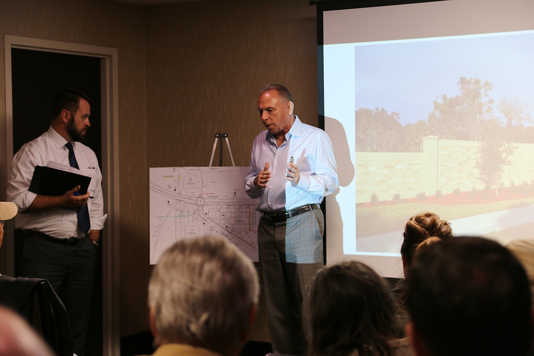 Granada Pointe developer Paul Holub holds a neighborhood meeting to discuss amendments to his project on Tuesday, Dec. 18. Photo by Jarleene Almenas