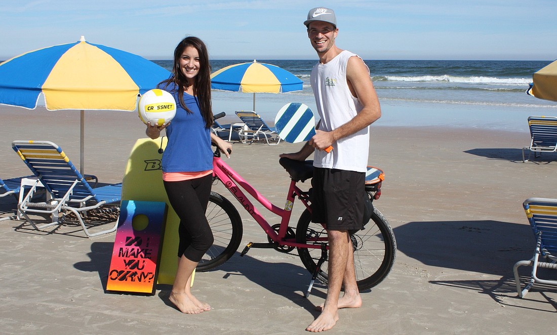 Victoria and Alex Kratochwill offer lots of activities for the beach at their business, Ormond Beach Rentals. Photo by Wayne Grant