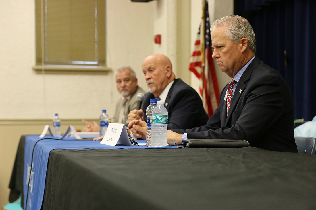 Volusia County Manager George Recktenwald, County Council Chair Ed Kelley and Ormond Beach City Commissioner Dwight Selby at the town hall meeting on the proposed half-cent sales tax on Tuesday, March 26. Photo by Jarleene Almenas
