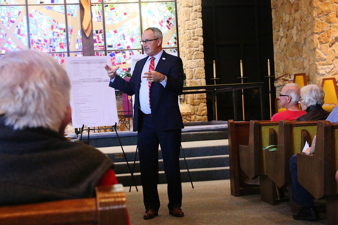 Clay Ervin,Â county director of Growth and Resource Management, speaks during the April 2 workshop at Grace Lutheran Church. Photo by Jarleene Almenas