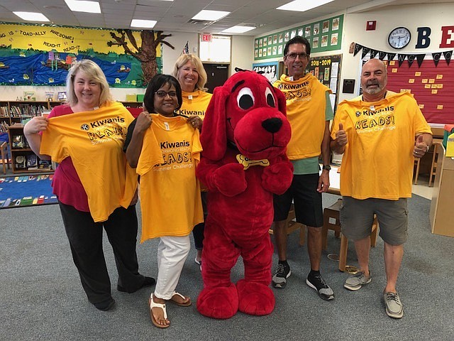 Kiwanis of Ormond Beach has kicked off a summer reading challenge for students. Shown are Kris Light, Robbin Durden, Amy Airgood, Clifford the Big Red Dog, Lyle Shearer and Dominic Scardigno. Courtesy photo