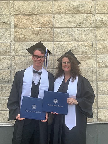 Matt and Katie Gabriel, mother and son, attend graduation ceremonies May 13. Photo by Wayne Grant