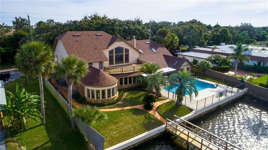 The top real estate transaction features a swimming pool and boat dock. Courtesy photo