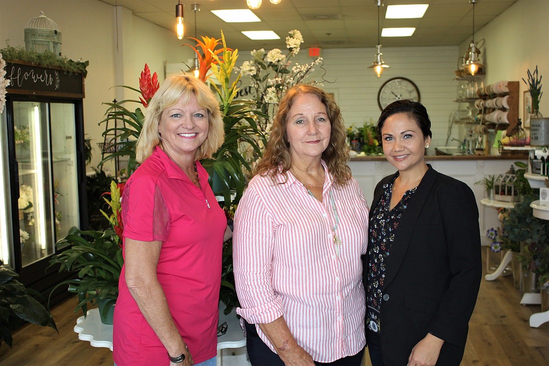 Gina Ruth, Aletha Power and Erena Manis now operate Best Wishes Flowers and Gifts. Photo by Wayne Grant
