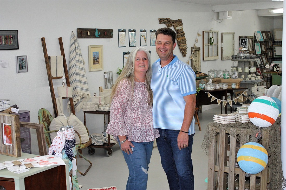 Kathe and Kevin Neat have opened Gathered, a lifestyle market. Photo by Wayne Grant