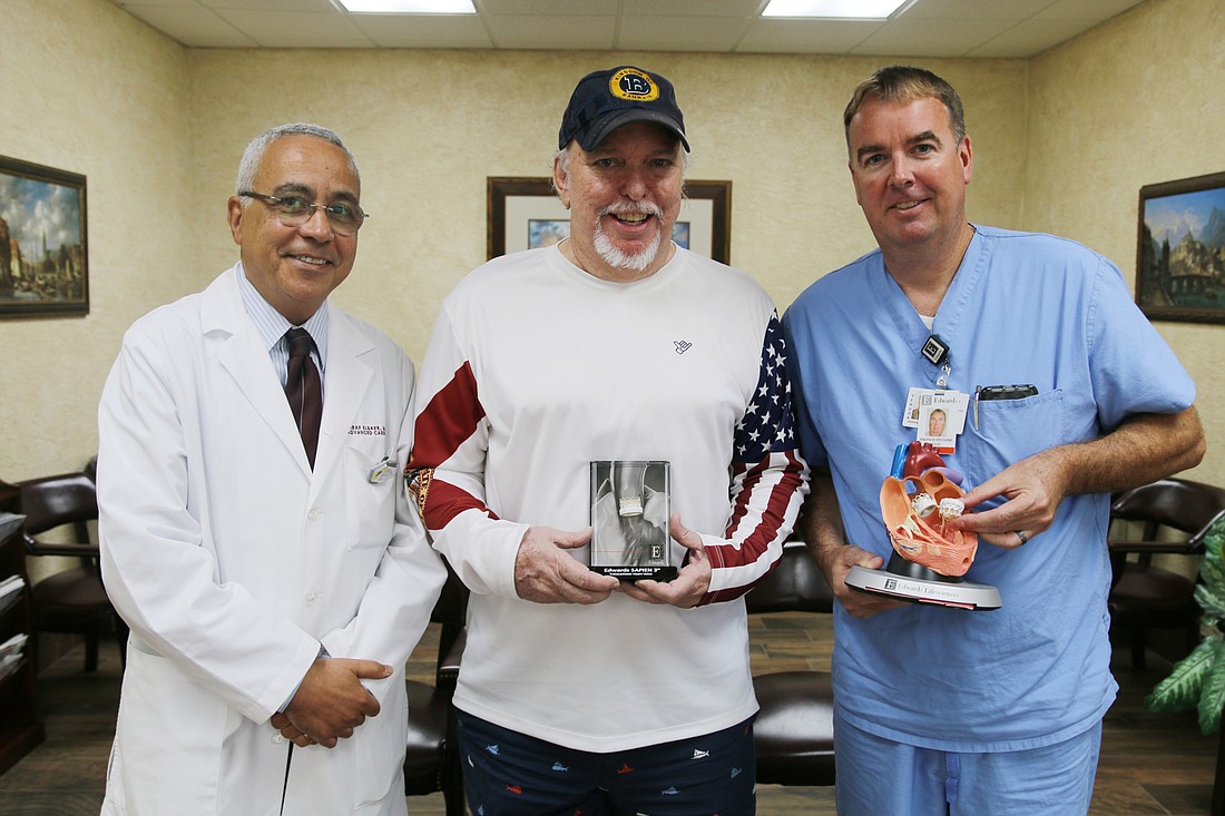 Dr. Ashraf Elsakr, Kim Jackson and Andrew Browne of Edwards Lifesciences at Elsakr's practice in Port Orange. Photo by Jarleene Almenas
