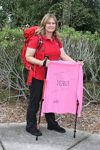 Dawn Beltrami will wear a T-shirt with the names of people affected by breast cancer on her 500-mile walk. Photo by Wayne Grant