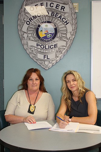 Detective Benita Hamilton and Assistant City Attorney Ann-Margret Emery handle Risk Protection Orders for the city. Photo by Wayne Grant