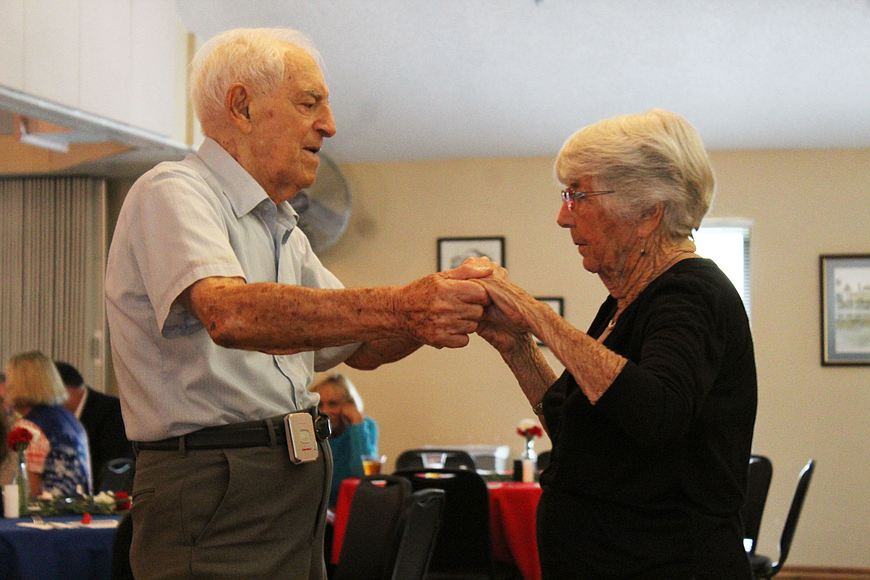 Navy vet Frank Cavale and Ethel Yardley dance to the classic song "Besame Mucho" played by the Blue Notes Band at the city's Veterans Day Celebration at the Ormond Beach Senior Center on Thursday, Nov. 9, 2017 . File photo by Jarleene Almenas