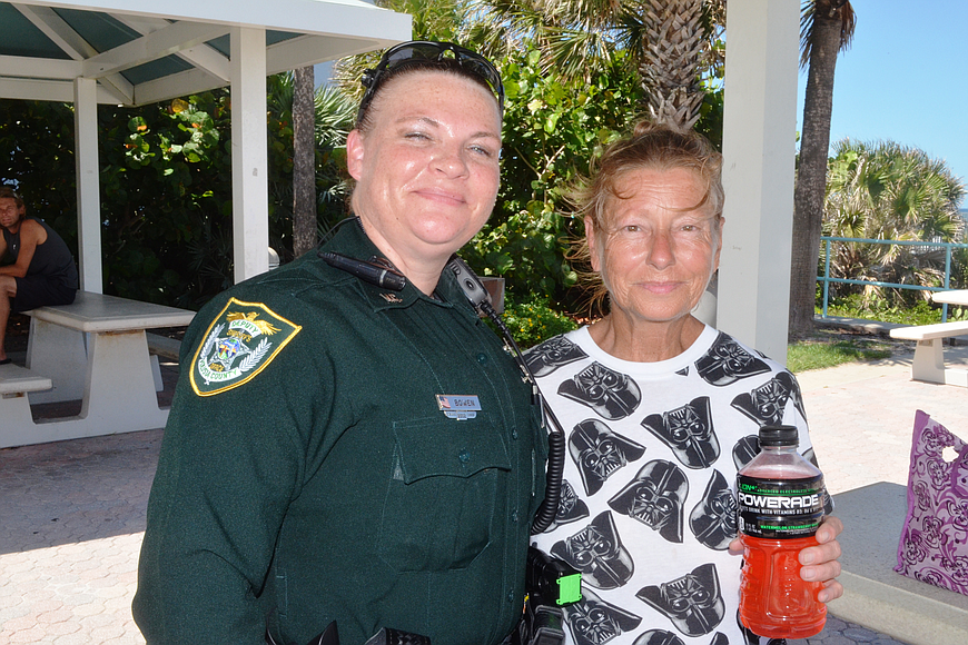 Deputy Donna Nichols is shown with Christine McCaleb, in this 2016 photo. File photo