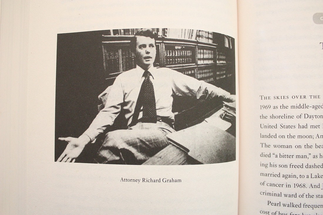 Richard Graham is shown as a young lawyer in the book, 'Beneath a Restless Sun.'