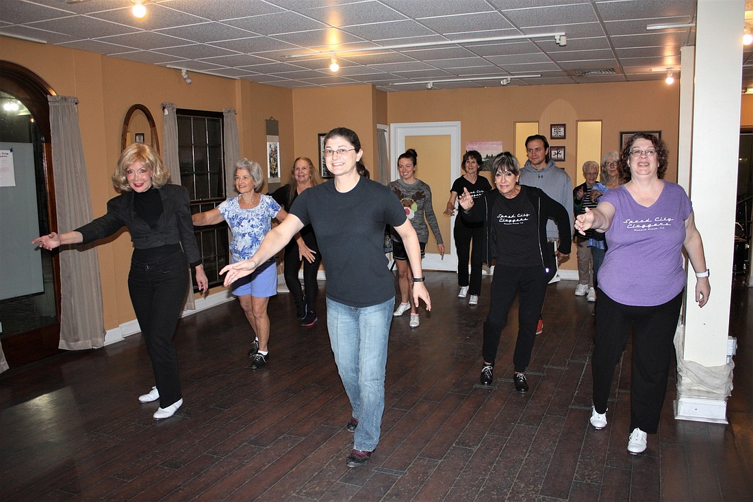 A clogging class meets at the Elite Academy of Music and Motion. Photo by Wayne Grant