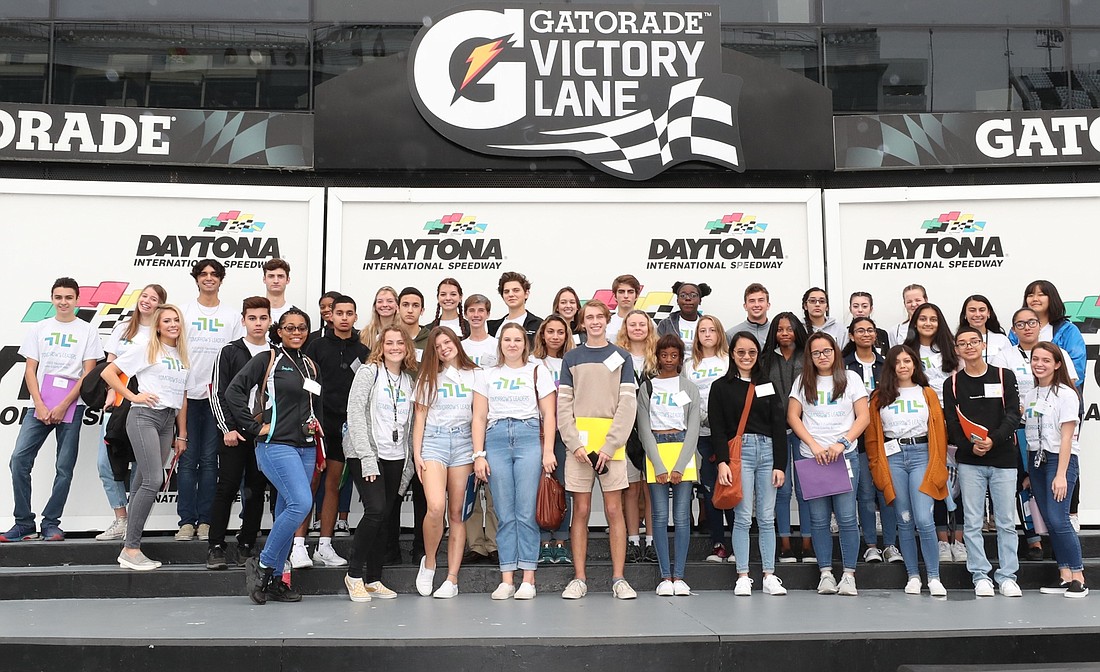 High school juniors in the FUTURES Foundation for Volusia County Schools' Tomorrow's Leaders training program pose for a photo while touring Daytona International Speedway. Courtesy photo