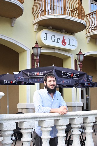 Ron Morali, manager, said the menu of the new J Grill is a fusion. Photo by Wayne Grant