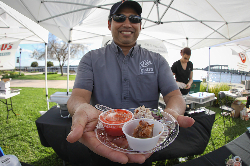La's Bistro's Carlos Soldevilla poses with his creations. Chilled watermelon gazpacho and whisky bread pudding were some of the items on the menu for the sixth-annual Taste of Ormond. File photo by Anthony Boccio