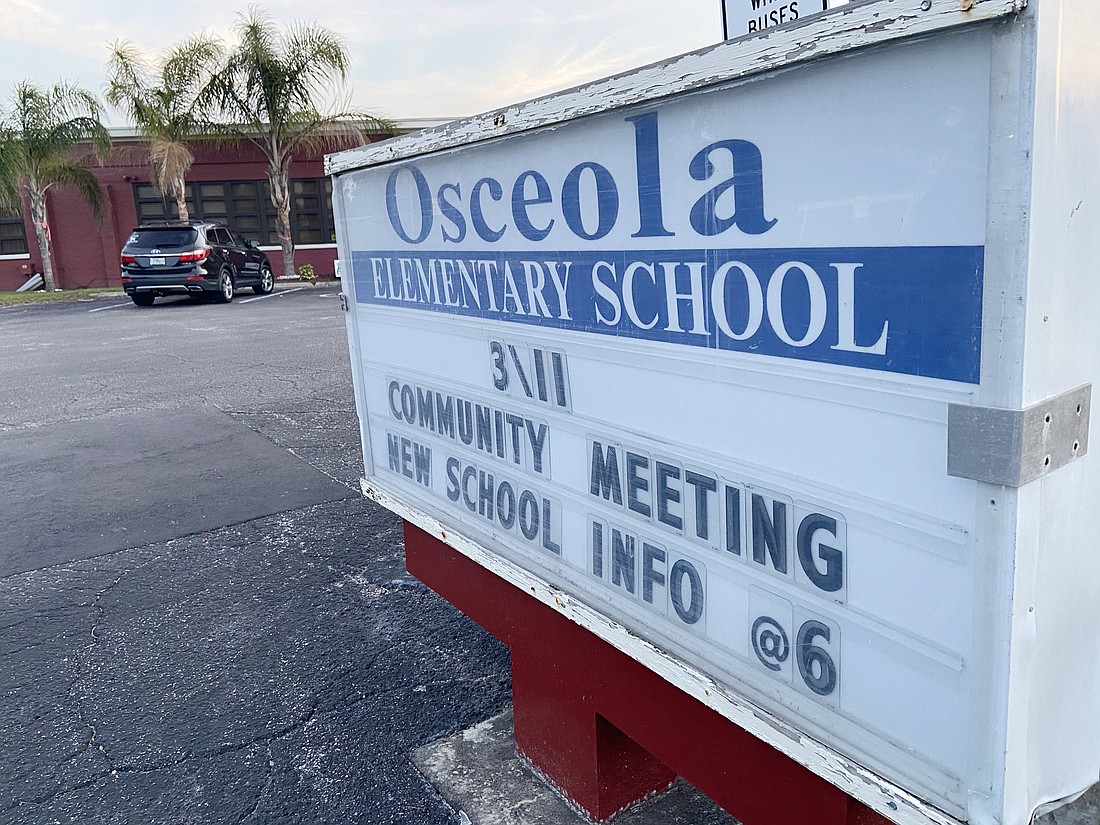 Osceola Elementary's sign shows the time and date of the community meeting on March 11. Photo by Jarleene Almenas