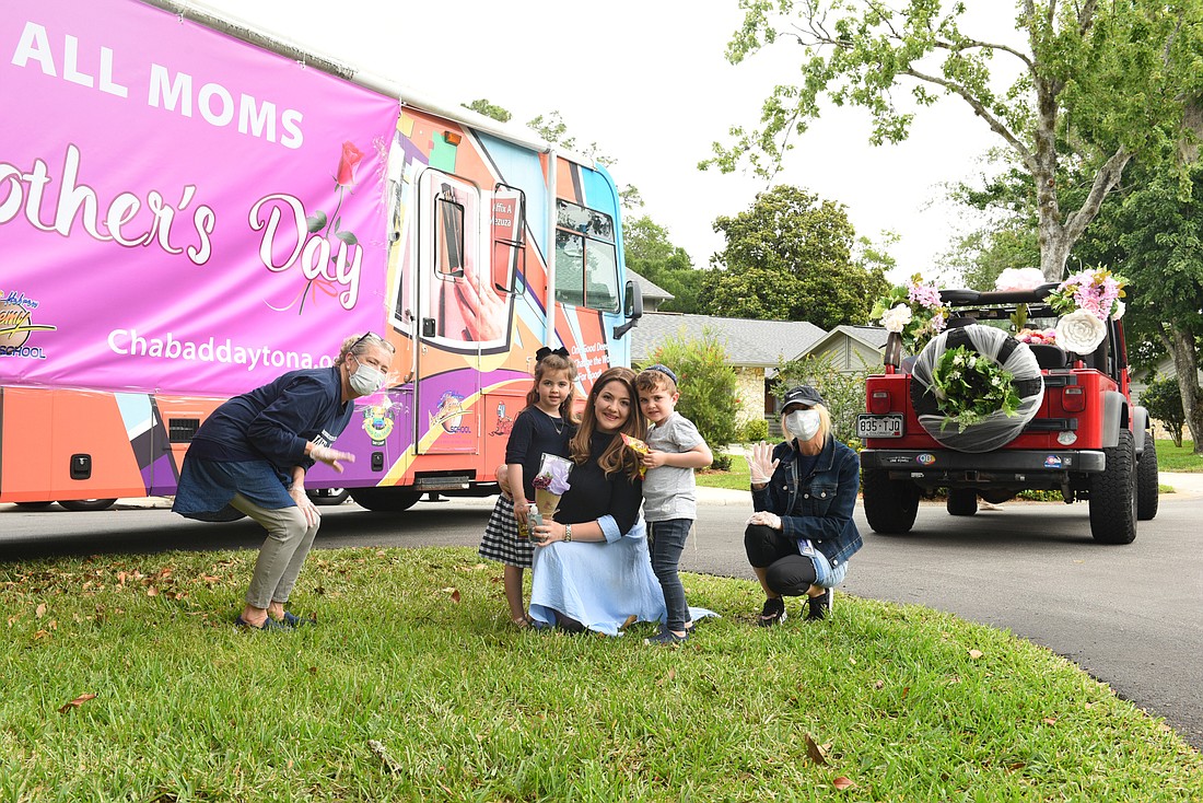 Chabad teamed up with Simply Roses to be able to bring a treat to community member's doors via the "Mitzvah Tank," dubbed the Mom Mobile. Courtesy photo