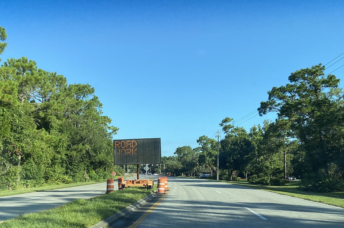 A sign alerts drivers to road work on Clyde Morris Boulevard. Photo by Jarleene Almenas