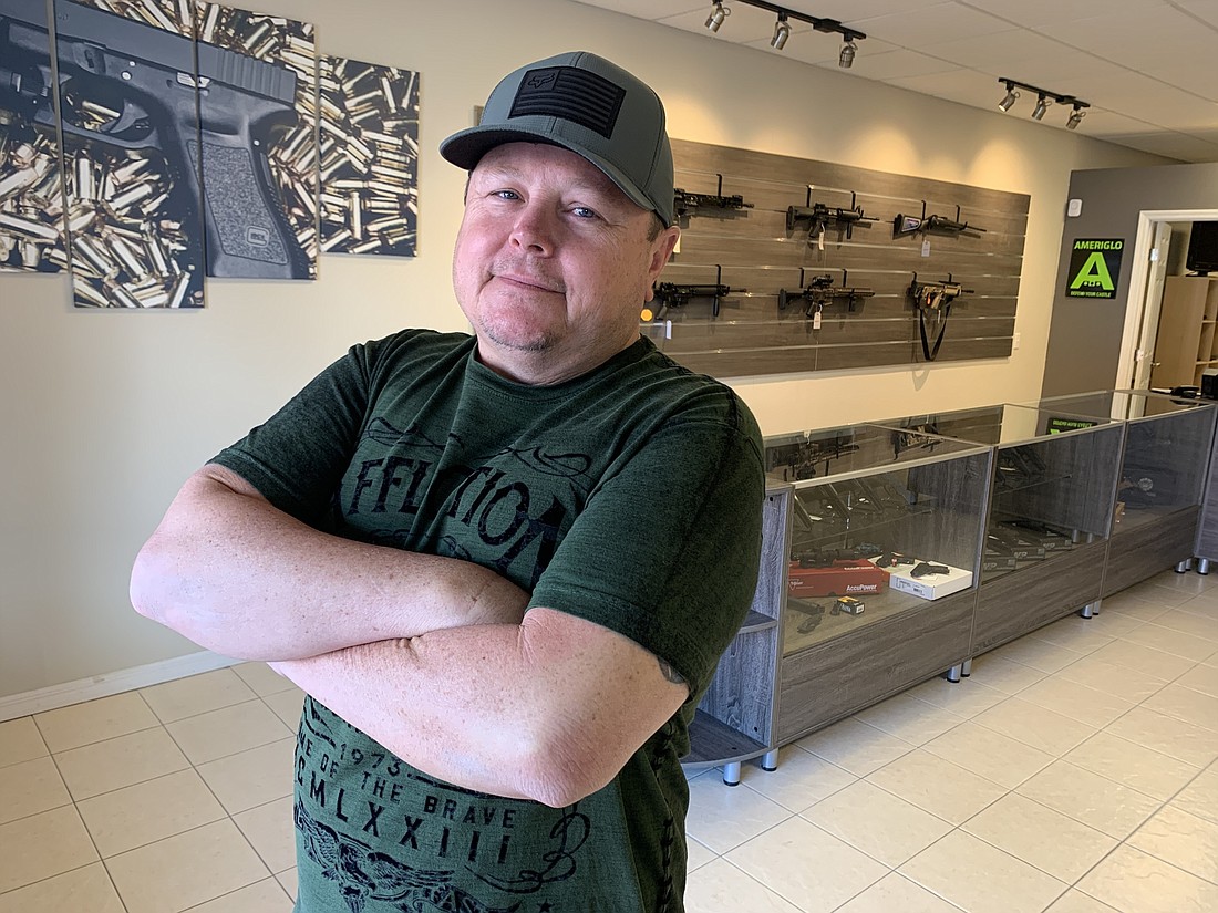 Elite Warrior Firearms owner Todd Glaczenski said it's been difficult to keep guns in stock at the shop. 'There's been times where I'm almost a gunless gun store,' he said. Photos by Brian McMillan