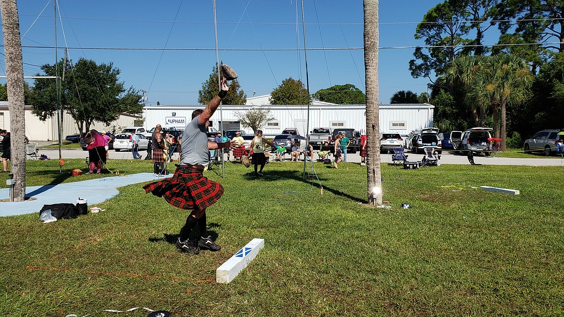 Men compete in the stone throw during the Ormond Beach Backyard Highland Games on Sept. 26. Courtesy photo