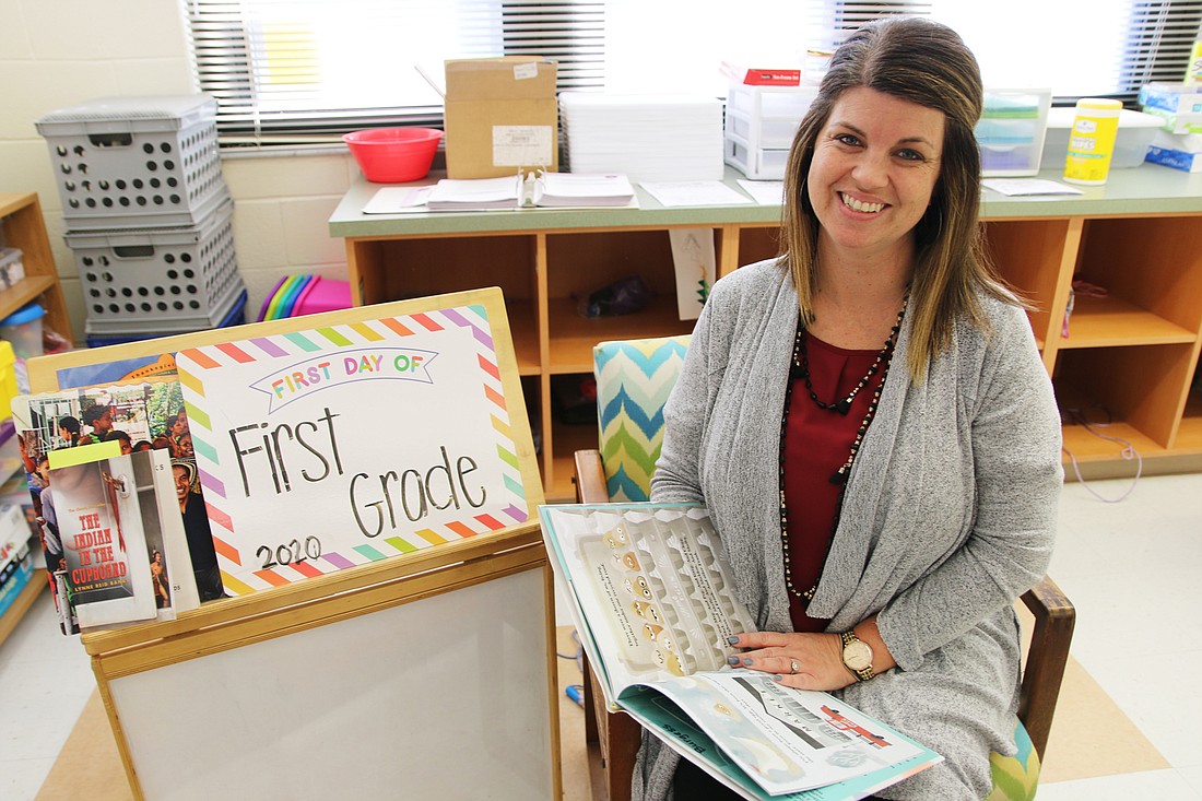 Amanda Burgess loves to encourage her students to read. Photo by Jarleene Almenas