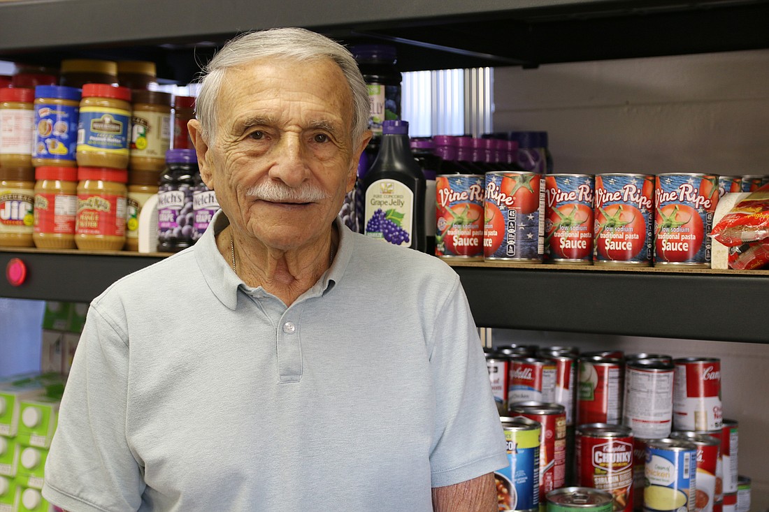 Vince Colonna said he'd been hoping for a food pantry at St. Brendan's Catholic Church for a long time. Photo by Jarleene Almenas
