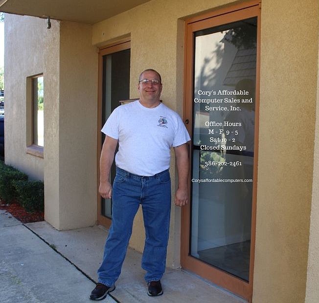 Cory Salmans in front of his new office in Ormond Beach. Courtesy photo