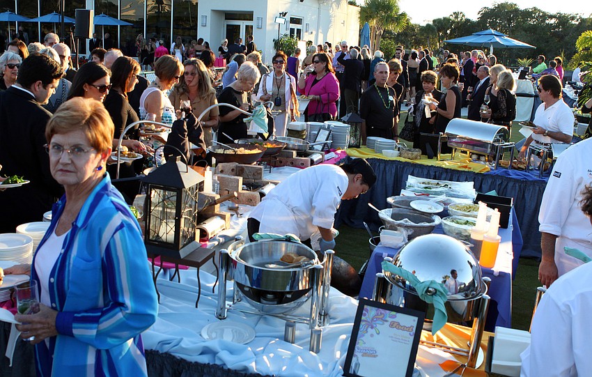 An overview shot of the crowd at the very colorful Black Tie Bash