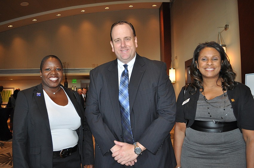 Dr. Raymonda Burgman, Jeffrey Woodin and Janice Smith