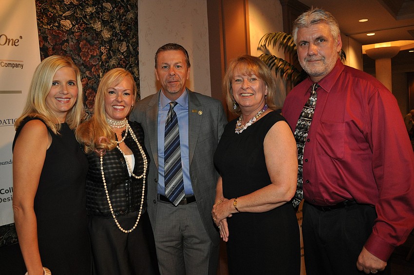 Make-A-Wish Foundation's Michelle Butler, honoree Susan Jones, Mike Martone, Kath Vroman and Bob Szafranski