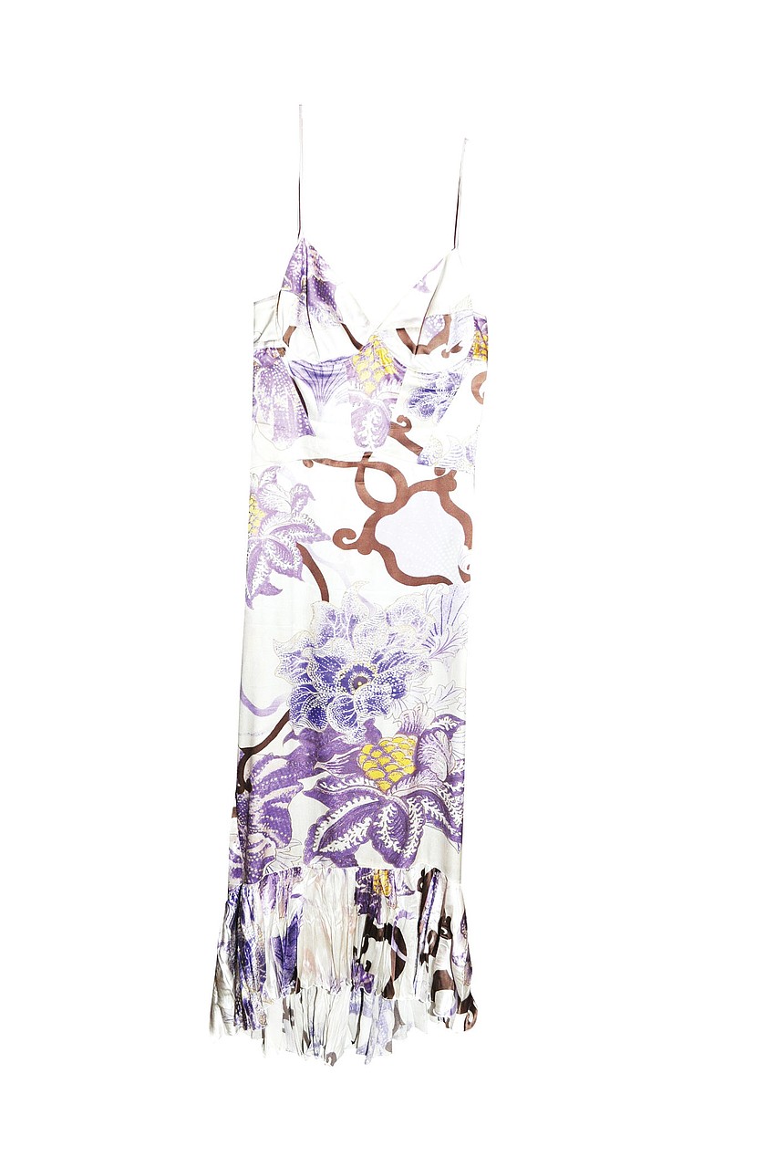 ROBERTO CAVALLI DRESS
'This is my sexy, showstopper dress. It fits fabulously. When I want some 'pow,' I wear this.'