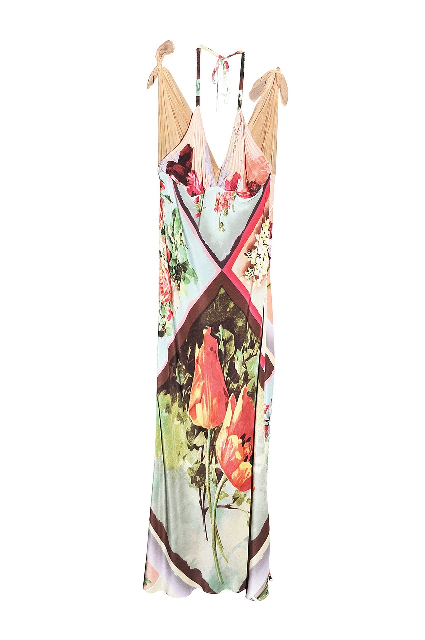 JEAN PAUL 
GAULTIER DRESS
'Jean Paul Gaultier is my favorite designer. I wear this to dinner parties or black-tie events. It's different than what everyone else would wear.'