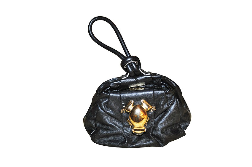 MARC JACOBS HANDBAG 
'This is different than what everyone else would wear. I can wear it dressy or sophisticated - very fashionable.'