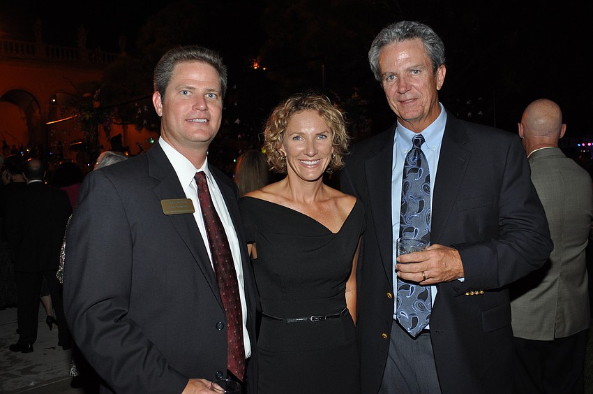 Paul and Jenni Hudson with George Morgan