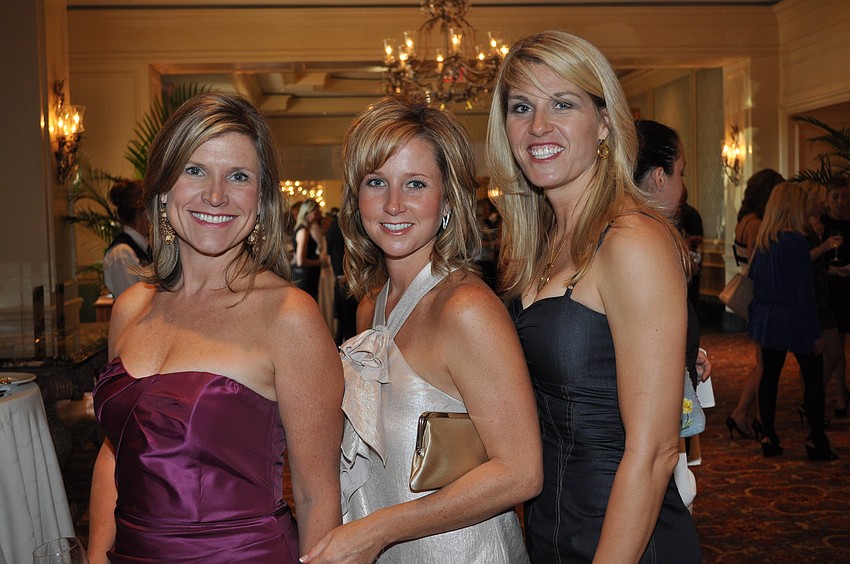 Traci Korkowski, Heather Vallett and Melissa Tomasso at Forty Carrots Family Center's Wine, Women and Shoes in October.