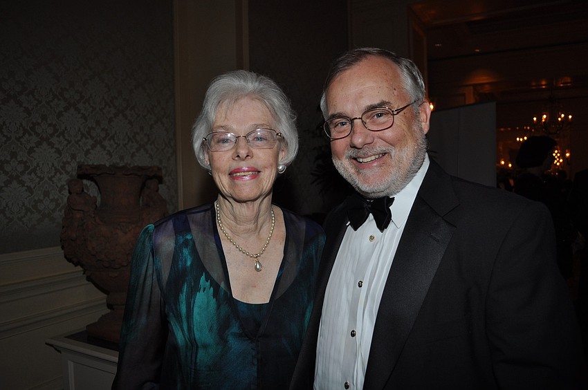 Bev Koski and Dr. Gordon Michalson, president of New College