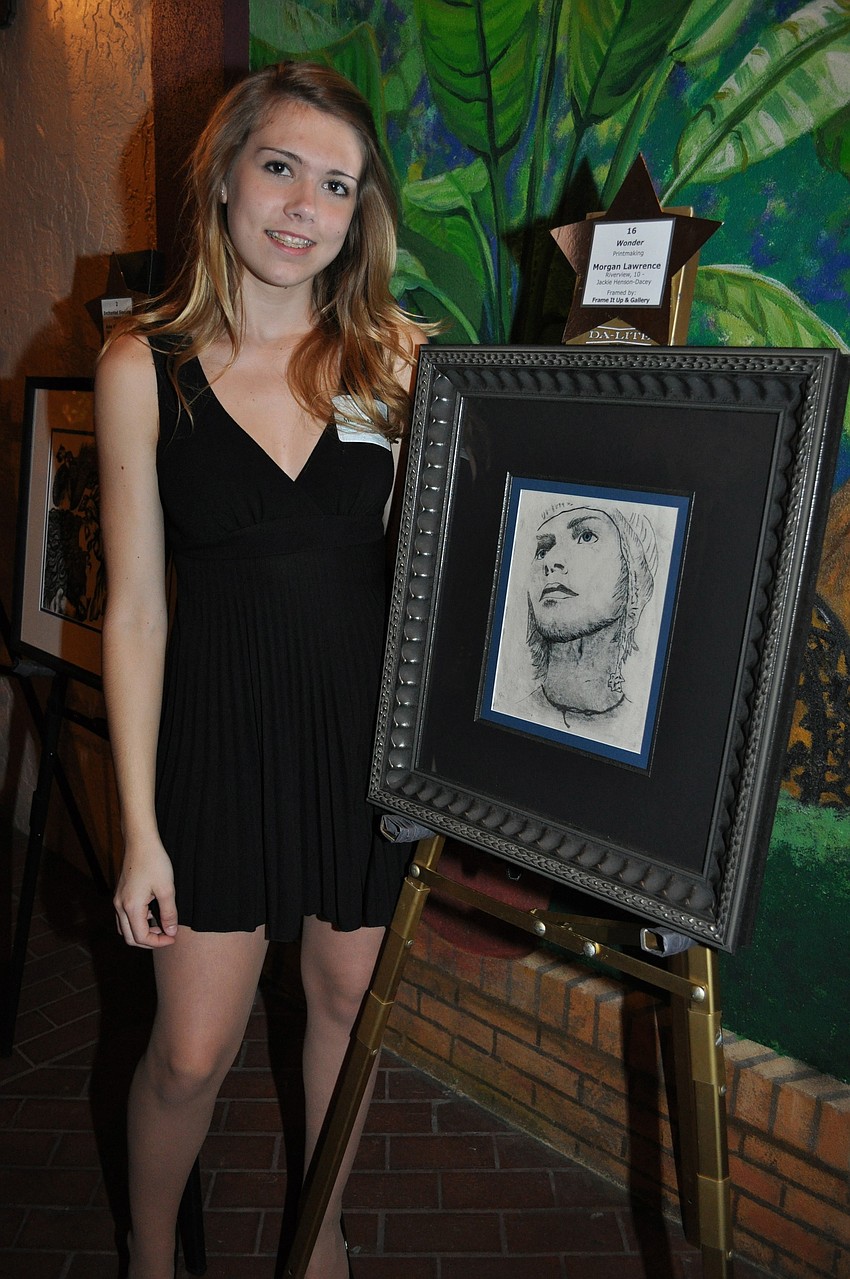 Morgan Lawrence with her artwork, 