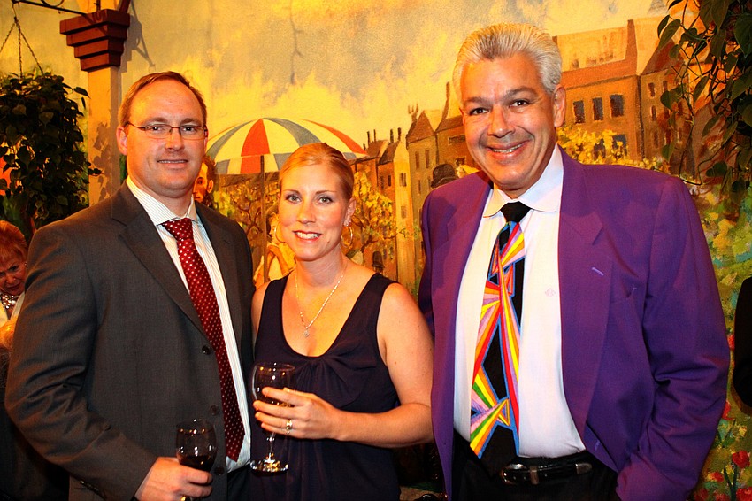 Pete and Stephanie Logan with Gregg Glasser