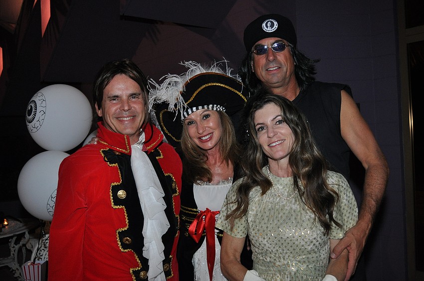 Bill and Elle McComb with Dave and Ellen Levine