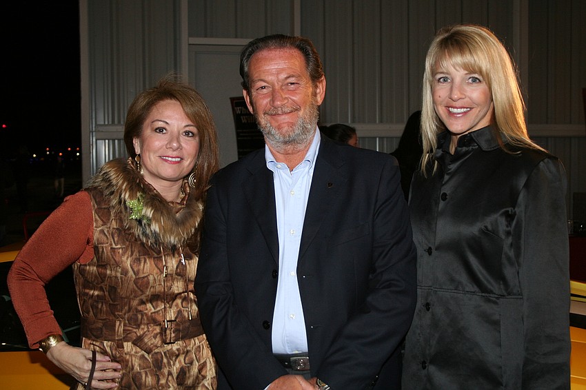 Giovanna McGrath, Valentino Balboni and Kristi Bratzke at Child Protection Center's Luxury Lifestyle Jet Port Reception in February.