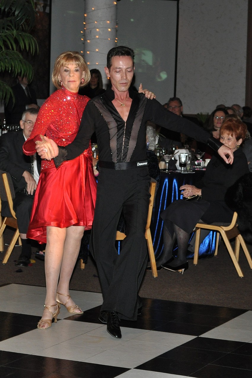 Gloria Moss and Jim Helmich dancing