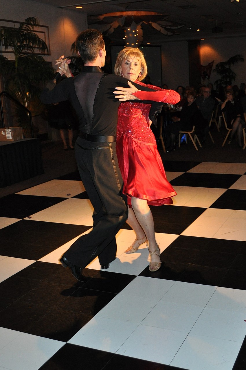 Gloria Moss and Jim Helmich dancing