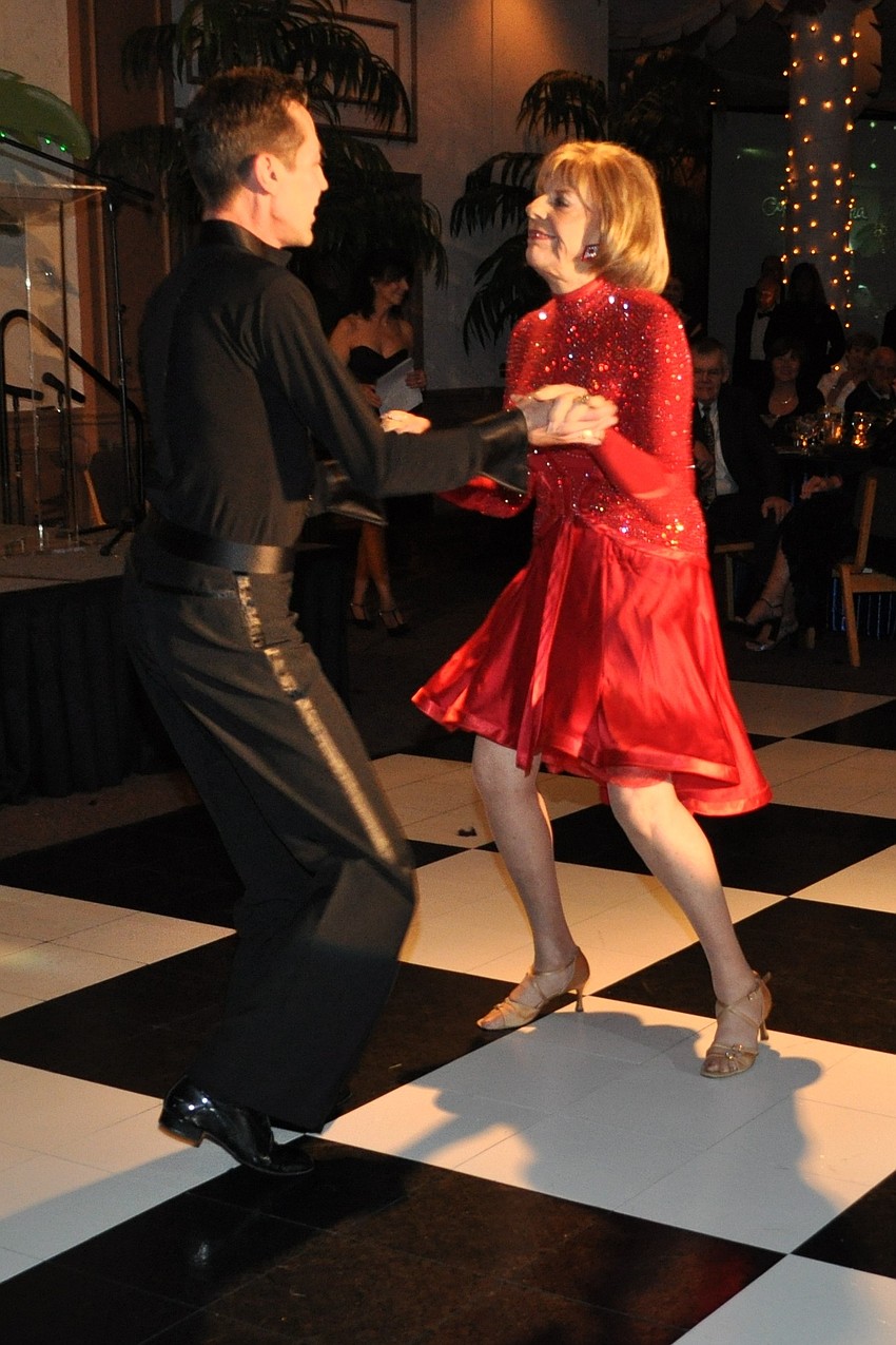 Gloria Moss and Jim Helmich dancing