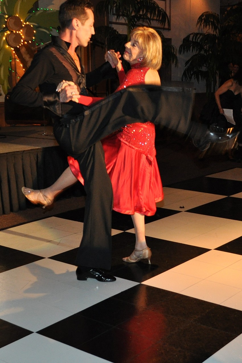 Gloria Moss and Jim Helmich dancing