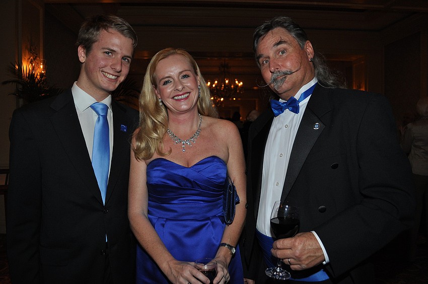 Chris Mulholland '12 with his mother Dr. Annette Maddox '93 and her husband Rick Maddox